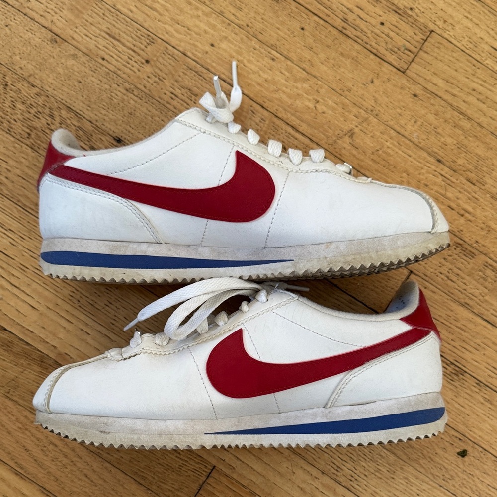 Nike White Cortez Sneakers with Red Swoosh and Blue Sole